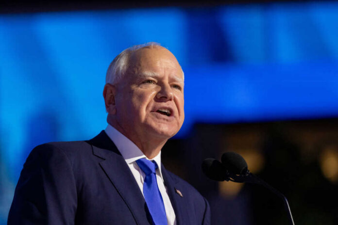 shutterstock2538652971jpg A government official delivering a speech at a podium with a blue background