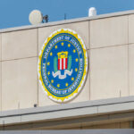 FBI Tip Unmasks Chilling UFC Ambush FBI emblem displayed on the exterior of a government building