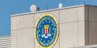 FBI emblem displayed on the exterior of a government building