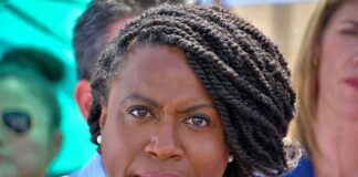 woman speaking at outdoor event