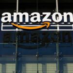 Cruise Missiles? Amazon Hub Targeted—Again Amazon logo on glass building facade