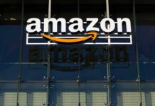 Cruise Missiles? Amazon Hub Targeted—Again Amazon logo on glass building facade