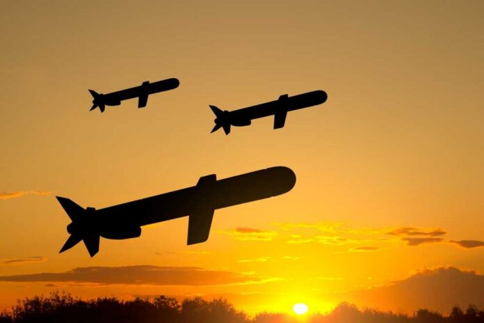 Silhouettes,Of,Tomahawk,Cruise,Missiles,Against,The,Sunset Silhouetted missiles flying against a sunset backdrop
