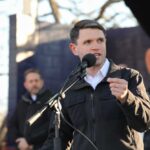 Texas Democrat Calls Out Her Party Individual speaking into a microphone at an outdoor event