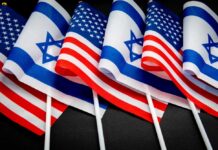 US Jerusalem Embassy Gets Permanent Home Flags of the United States and Israel displayed together