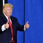 Trump Just Surpassed GOP’s Biggest Icons man in suit giving two thumbs up