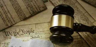 Judge’s gavel on U.S. Constitution documents