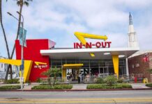 Fast-Food Launch Becomes Crime Scene In-N-Out Burger restaurant exterior with red and yellow design