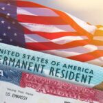State Department’s Quiet Mass Revocations U.S. flag with visa and permanent resident cards