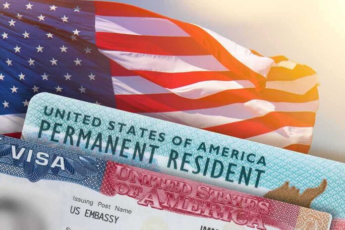 U.S. flag with visa and permanent resident cards
