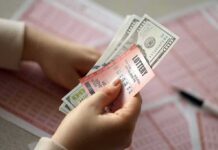 Old-School Scam Hits NYC Again Hands holding lottery tickets and U.S. dollar bills