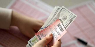 Hands holding lottery tickets and U.S. dollar bills