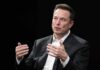 Musk Money Tsunami Targets Texas man in a suit speaking with hand gestures