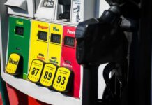 Gas Fantasy Collides With War Reality Gas pump with diesel, regular, plus, and premium fuel options