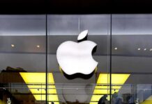 Apple logo on glass storefront