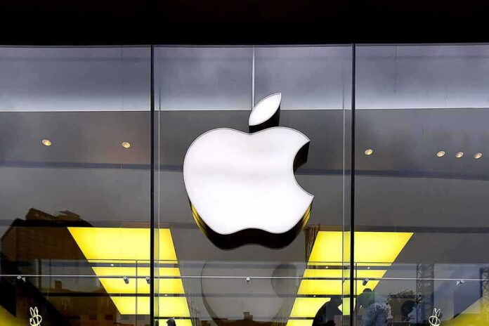 Apple logo on glass storefront