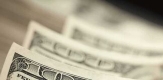 Stack of U.S. hundred dollar bills in close-up