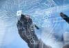 Trump Torches AI ‘Apocalypse’ Hype hands interacting with a digital AI interface