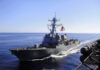 Red Sea Meltdown Cornered Trump naval destroyer sailing at sea with flag flying