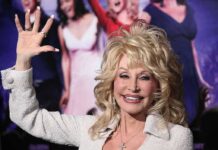 Dolly Parton waving at an event