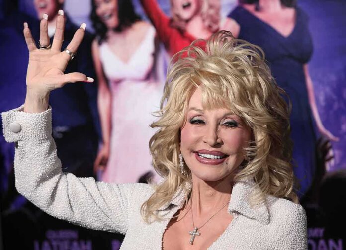 Dolly Parton waving at an event