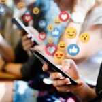 No Influencers Sign Sparks National Fight people using smartphones with social media reactions