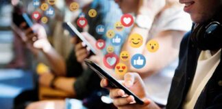 people using smartphones with social media reactions