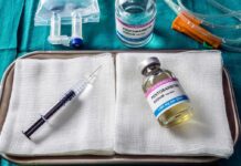 Assisted-Dying Standoff Ignites In Illinois Medical tray with syringe and pentobarbital vials on gauze