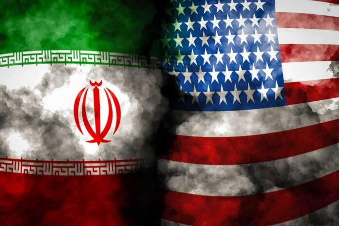 Iran and United States flags with smoky overlay