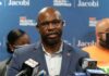 Mayor’s 9/11 Move Triggers Fury Man in suit speaking at a press conference