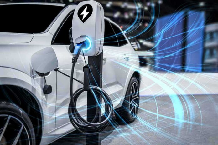 Electric car charging at a station