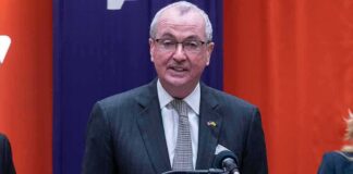 Phil Murphy speaking at a podium