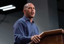 Man speaking at a podium