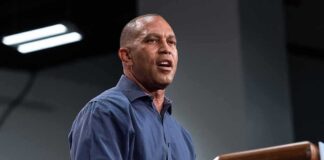 Man speaking at a podium