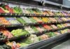 Summer Food Scare Explodes Across 20 States Grocery store produce aisle with stacked fresh vegetables