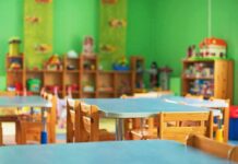 Parents Allege Brutal Daycare Fight Club Preschool classroom with small tables and wooden chairs