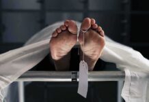 AOC’s Number Collides With Autopsies Human feet with toe tag on a morgue gurney