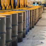 Trump Greenlights Tax-Free Highway Diesel Rows of industrial metal barrels with yellow lids