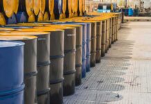 Trump Greenlights Tax-Free Highway Diesel Rows of industrial metal barrels with yellow lids