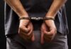 Bodycam Arrest Stuns McDonald’s Crowd person with hands cuffed behind back