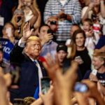 Donald Trump waves to a cheering crowd; Taško Načić present among attendees