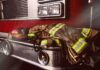 Firefighter gear on the front of a fire truck