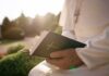 Vatican Rush: Pope Heads Into Surgery Person in white robe holding a Bible outdoors