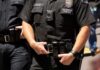 LAPD Chief On The Chopping Block Police officers in black uniforms with duty belts