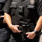 LAPD Chief On The Chopping Block Police officers in black uniforms with duty belts