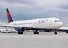 Shocking Bite Claim on Delta Flight Delta Air Lines passenger jet taxiing on airport tarmac