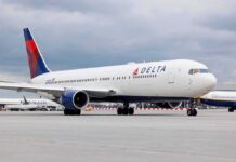 Delta Air Lines passenger jet taxiing on airport tarmac