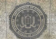 Shock Exit Rattles FBI Leadership FBI seal on a granite wall