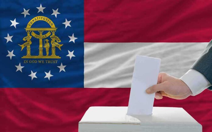 Georgia state flag with a hand casting a ballot